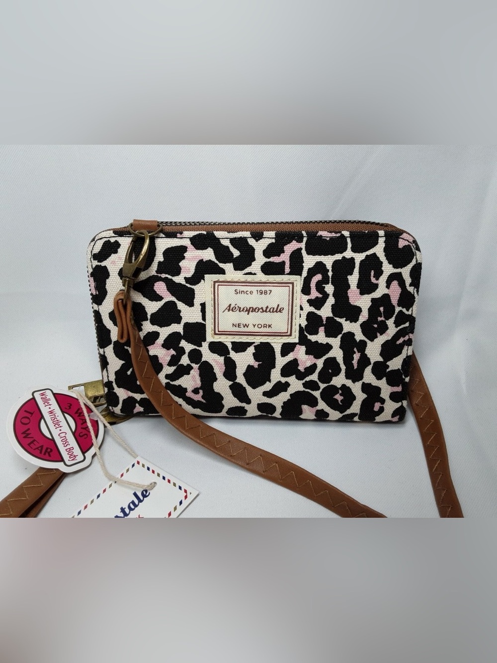 Aeropostale Cream, Black & Pink Leopard Print Wristlet with Brown Strap